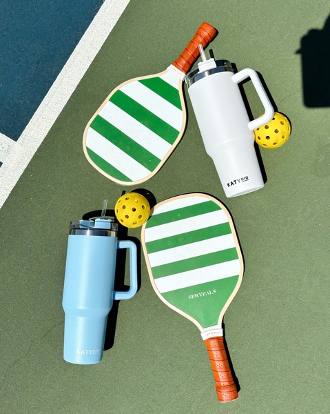 pickleball paddle, pickleball ball, insulated tumbler, travel mug, pickleball gear, sports water bottle, new arrival, flat lay, fresh, energetic, green, white, blue